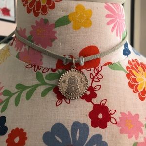 Distroller Guadalupe medal necklace on suede